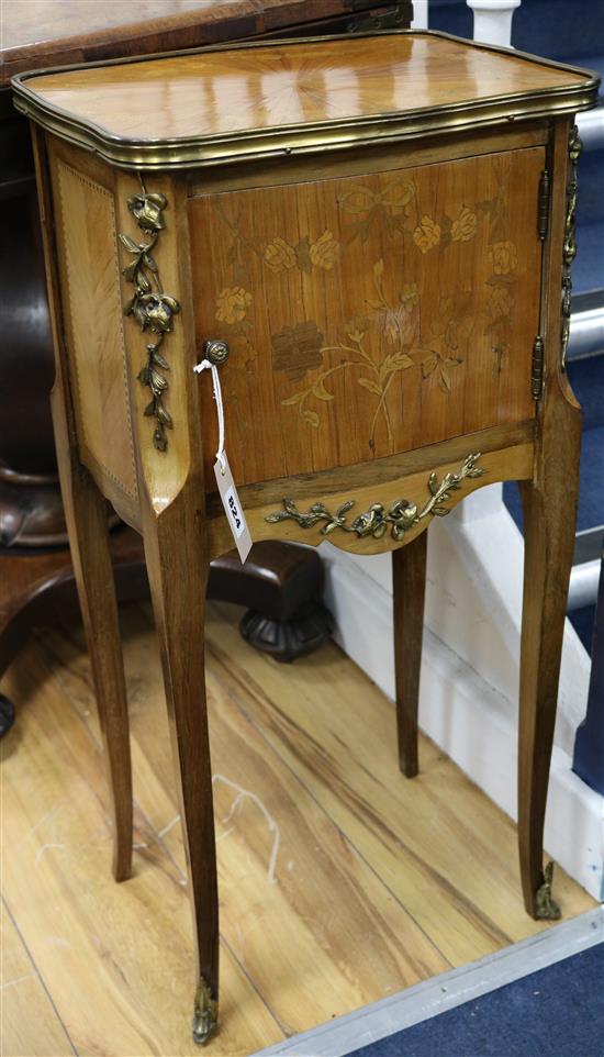 A Louis XV style marquetry inlaid ormolu mounted bedside cupboard, H.74cm